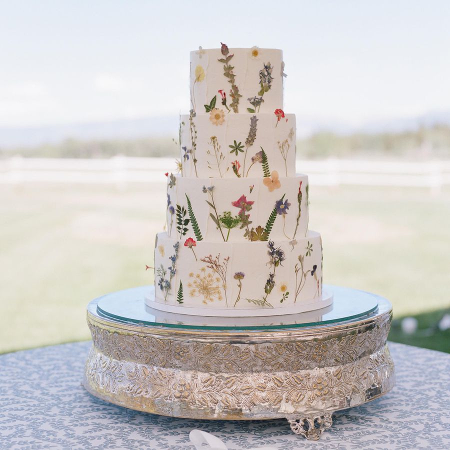 summer wedding cake with pressed flowers